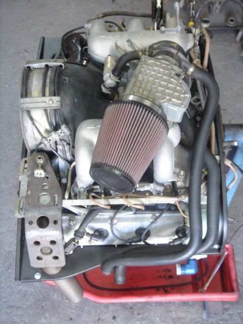 Porsche 3.2 liter six-cylinder engine with electronic fuel injection, top-left view