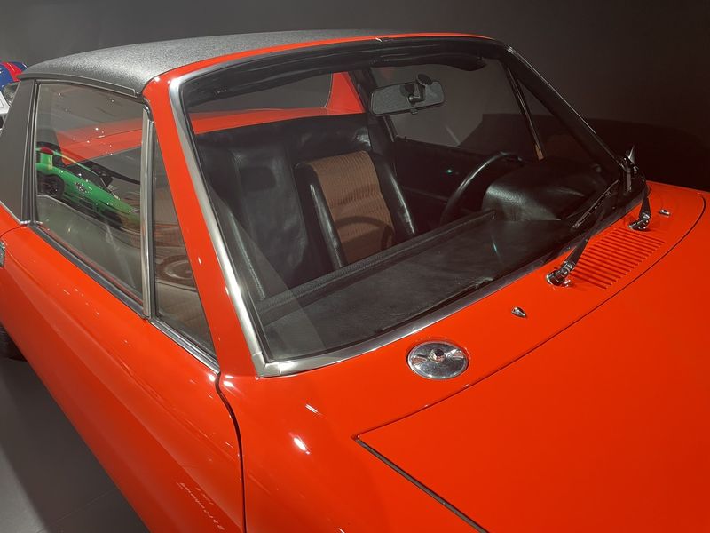 Cockpit of the orange Porsche 914-8 prototype at the Porsche Museum