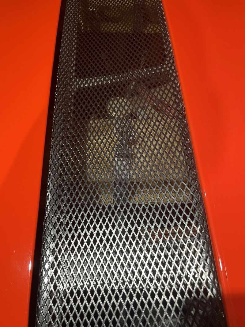 Engine-lid vent mesh on the orange Porsche 914-8 prototype at the Porsche Museum